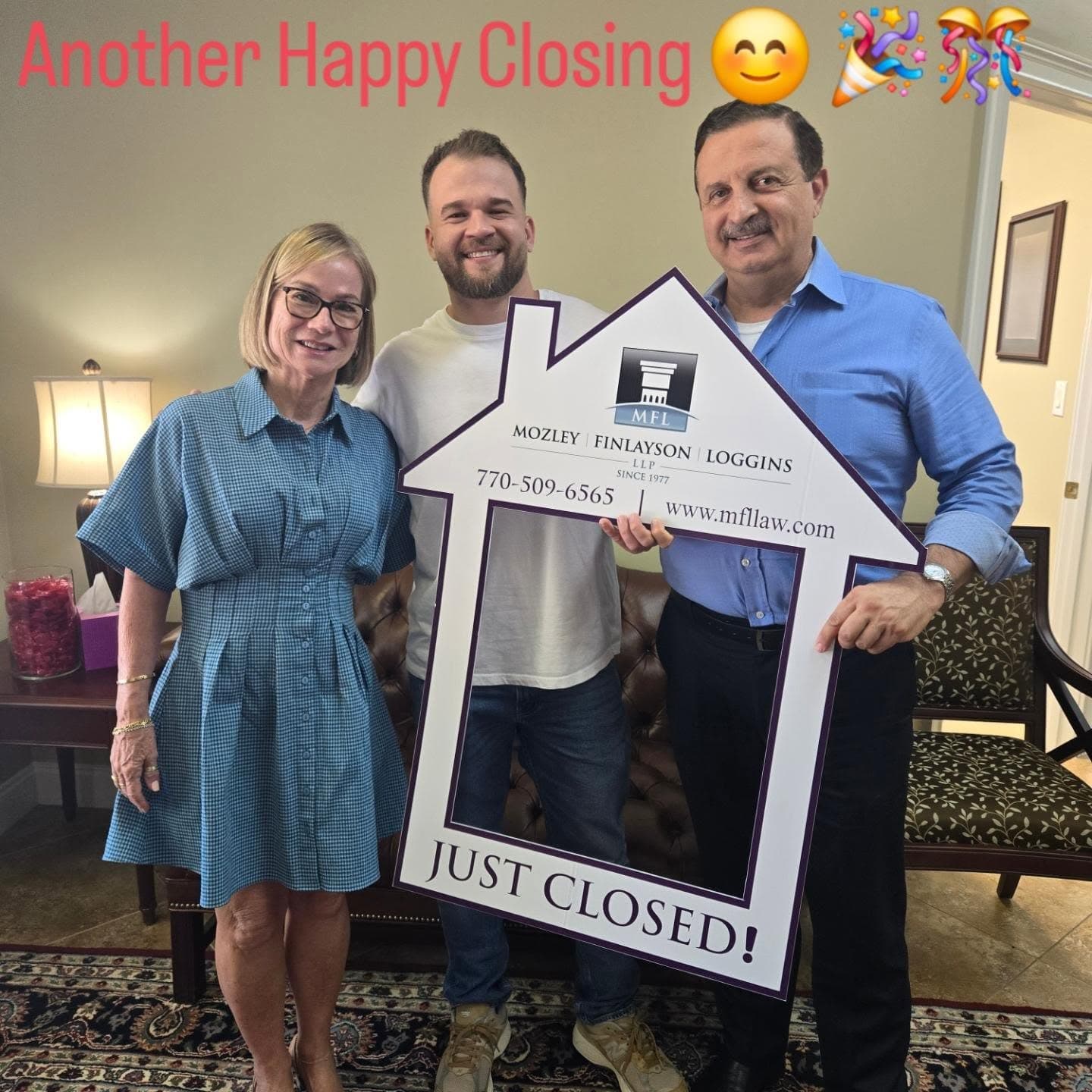 Mark Habbal celebrating a home closing with clients