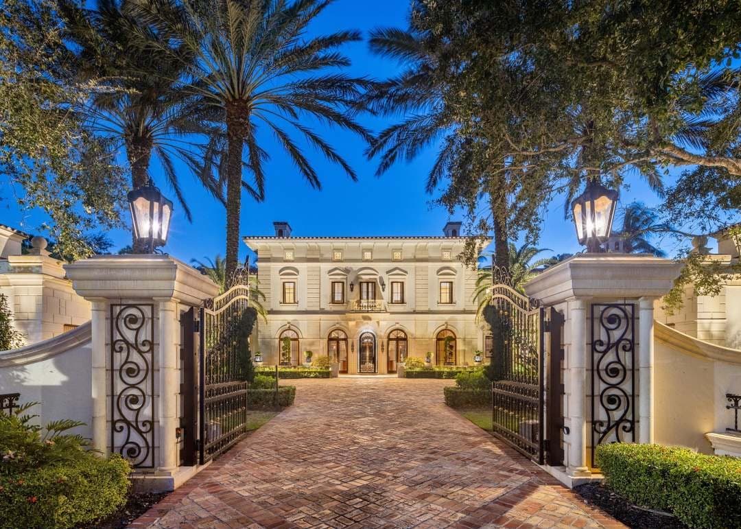 Palm-lined entrance to the Jupiter, Florida home where Mark helped a client with financing