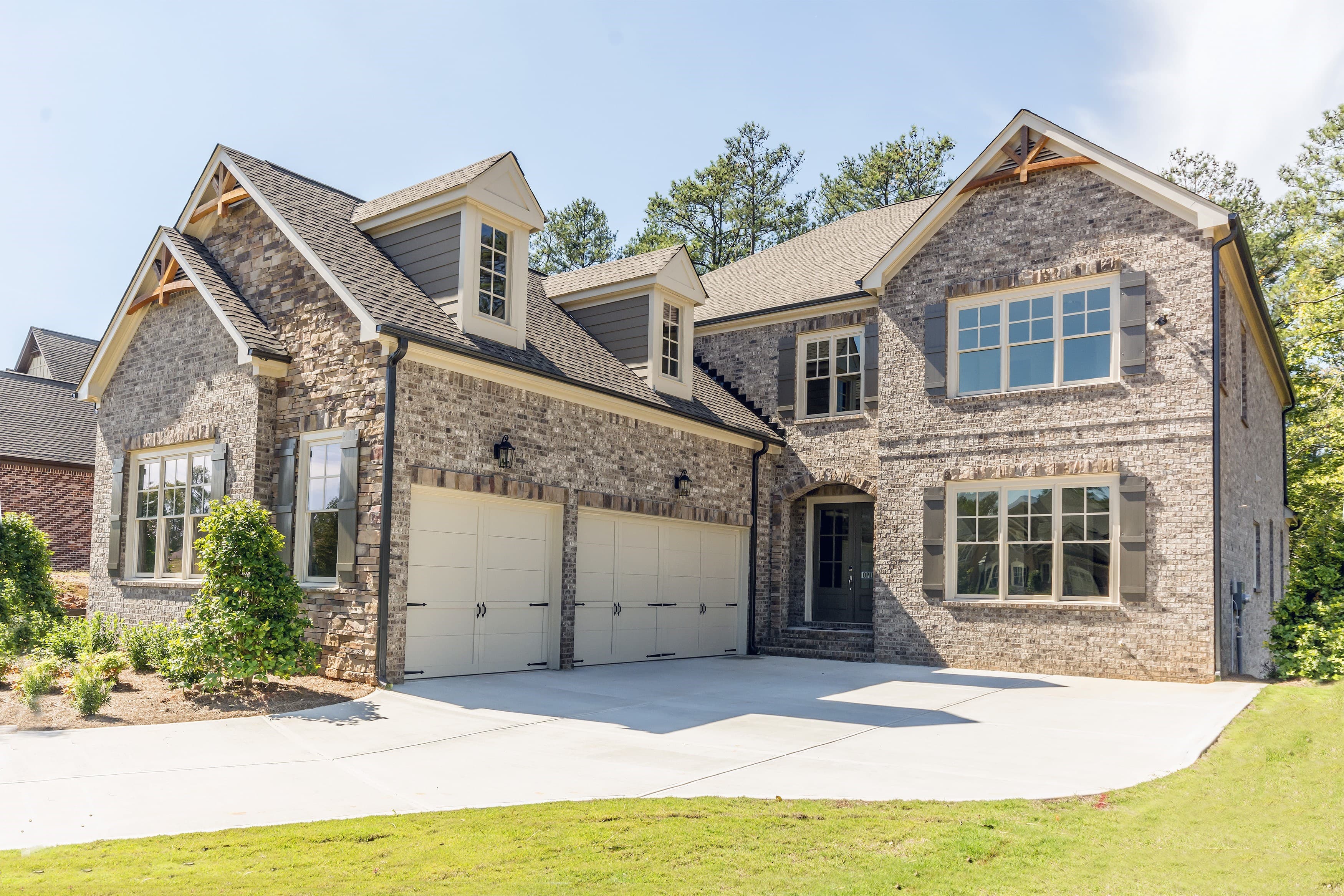 Brick home with landscaped gardens in Atherton Park, Roswell, Georgia